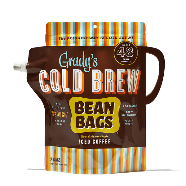 Front view of Grady’s Cold Brew Bean Bags in French Vanilla flavor. The brown, mug-shaped “Spouch” pouch features bold orange and white lettering that reads “Grady’s Cold Brew Bean Bags” and “New Orleans-Style Iced Coffee.” A large light blue circle in the top left corner reads “French Vanilla.” A striped pattern appears at the top and bottom of the pouch. A label near the top right corner says “Makes 48 Fluid Ounces,” and text on the sides highlights prep instructions.