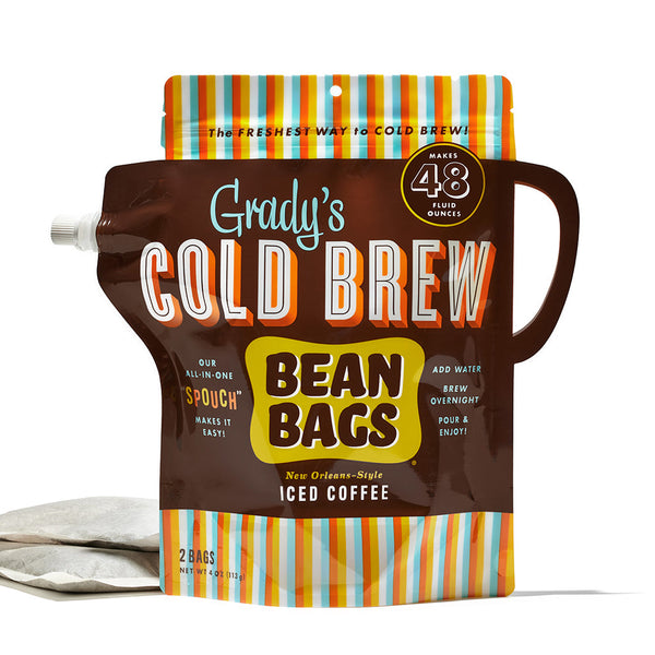 Grady’s Cold Brew Bean Bags in the all-in-one “Spouch” format. The brown pouch with a built-in handle and pour spout features colorful stripes on the top and bottom. Text on the packaging highlights that it makes 48 fluid ounces, includes two bags, and is brewed overnight with added water. Two bean bags are shown beside the pouch.