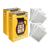 Product image of Grady’s Cold Brew ground coffee pouch boxes on a white background, shown with several individual coffee bean bags removed from the packaging.