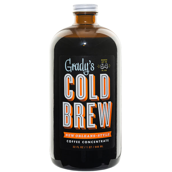 Glass bottle of Grady’s Cold Brew New Orleans–style coffee concentrate, 32 fl oz, featuring a black label with bold “Cold Brew” lettering in white and orange and a note indicating it makes up to 64 fl oz