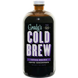 Glass bottle of Grady’s Cold Brew Cocoa Mocha coffee concentrate, 32 fl oz, featuring a black label with bold white and purple “Cold Brew” lettering and a note indicating it makes up to 64 fl oz