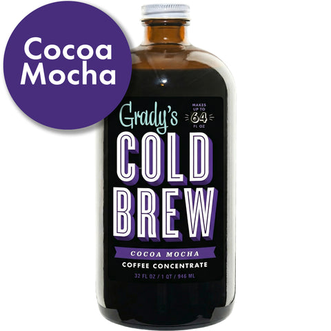 Grady’s Cold Brew Cocoa Mocha Coffee Concentrate in a 32-ounce glass bottle with a silver cap. The label reads “Grady’s Cold Brew – Cocoa Mocha – Coffee Concentrate – Makes 8 Cups.” A purple circle in the top left corner says “Cocoa Mocha.” The bottle is displayed on a white background. [collection-only]