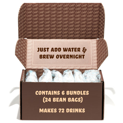 Open Grady's Cold Brew shipping box with six wrapped bundles inside. Box text reads: "Just add water & brew overnight. Contains 6 bundles (24 Bean Bags). Makes 72 drinks."