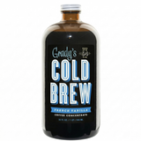 Front view of a Grady’s Cold Brew French Vanilla coffee concentrate bottle with a black label and blue and white lettering, featuring “Grady’s Cold Brew,” “French Vanilla,” and “Coffee Concentrate,” in a 32 oz glass bottle.