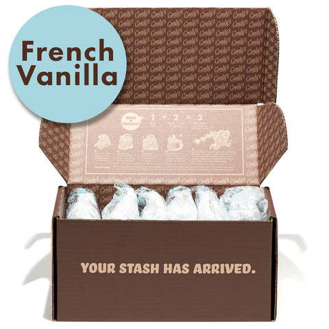 Open Grady’s Cold Brew shipping box labeled “Your stash has arrived,” containing individually wrapped French Vanilla bean bags, with a blue circle label that says “French Vanilla.” [collection-only]