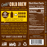 Back label of a Grady’s Cold Brew bottle showing product information including “Grady’s Cold Brew,” claims such as all natural, sugar-free, vegan, low calorie, non-GMO, and gluten-free, brewing directions, ingredients (water, coffee, chicory, spices), and a Nutrition Facts panel listing 20 calories per serving, along with icons for Non-GMO Project Verified, Made in NYC, kosher certification, and recycling.